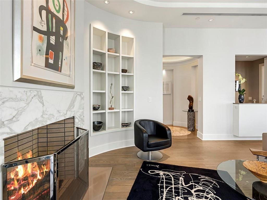 3376 Peachtree Road Northeast, Unit 44B Atlanta, GA 30326 - Photo 7 of 58 a living room with furniture and a rug