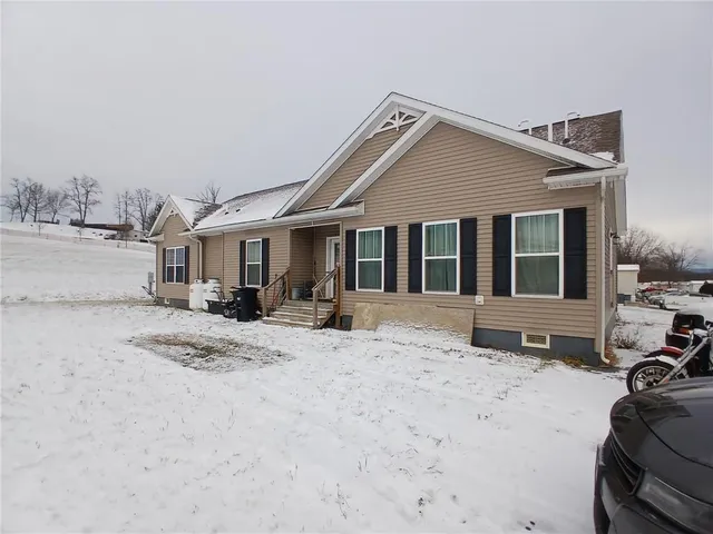 a view of a house with a patio