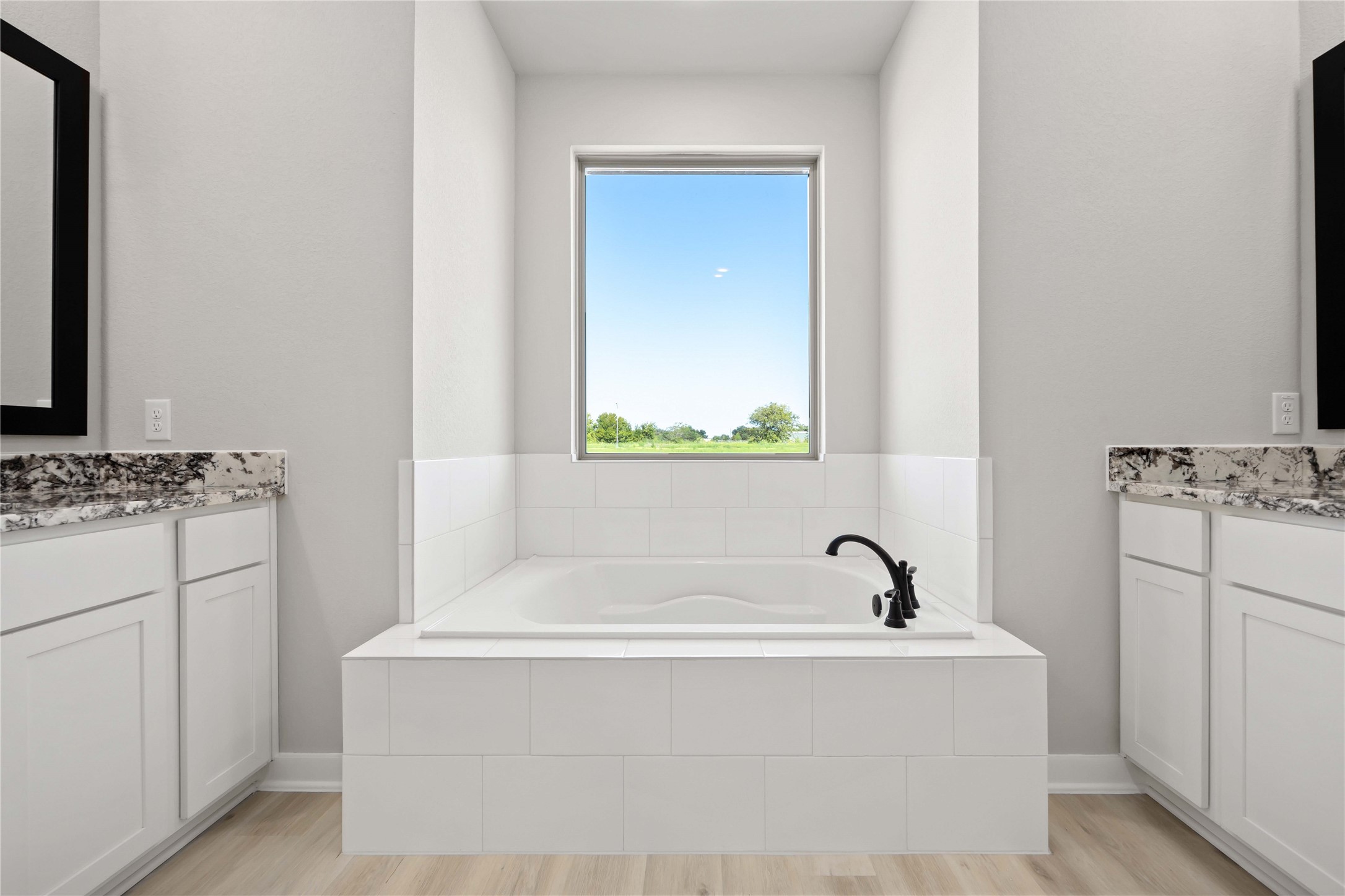 6702 Pelican Lane Beasley, TX 77417 - Photo 25 of 29 The luxurious owner's retreat is a private oasis with a spa-inspired bath and an extended walk-in closet.