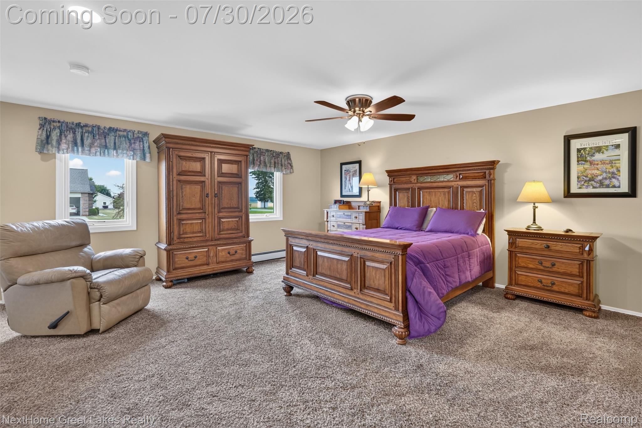 6249 North New Lothrop Road New Lothrop, MI 48460 - Photo 27 of 50 Spacious bedroom featuring neutral wall tones, plush carpet flooring, two windows, recessed lighting, and a ceiling fan with light fixture