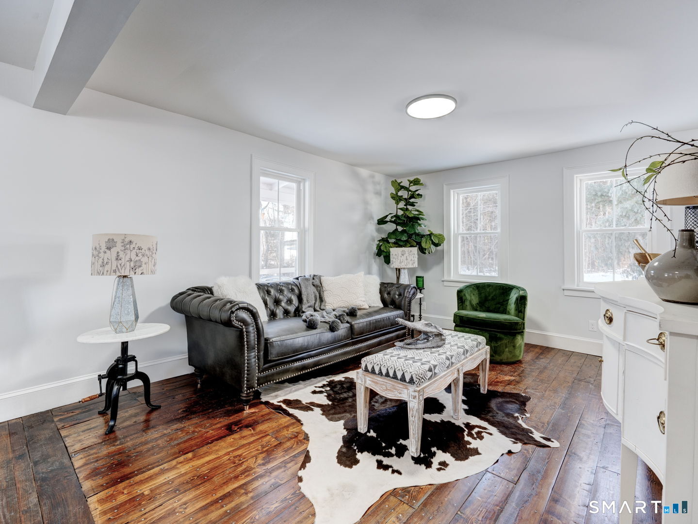 76 Griffin Road East Windsor, CT 06016 - Photo 13 of 35 a living room with furniture and a wooden floor