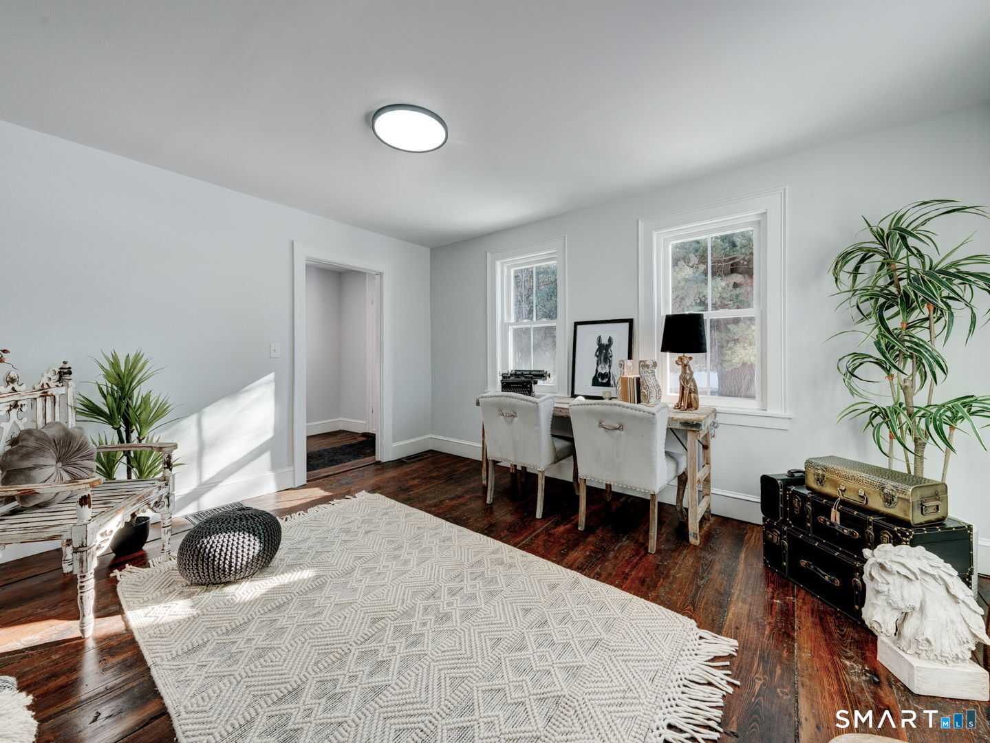 76 Griffin Road East Windsor, CT 06016 - Photo 17 of 35 a living room with furniture potted plant and a table