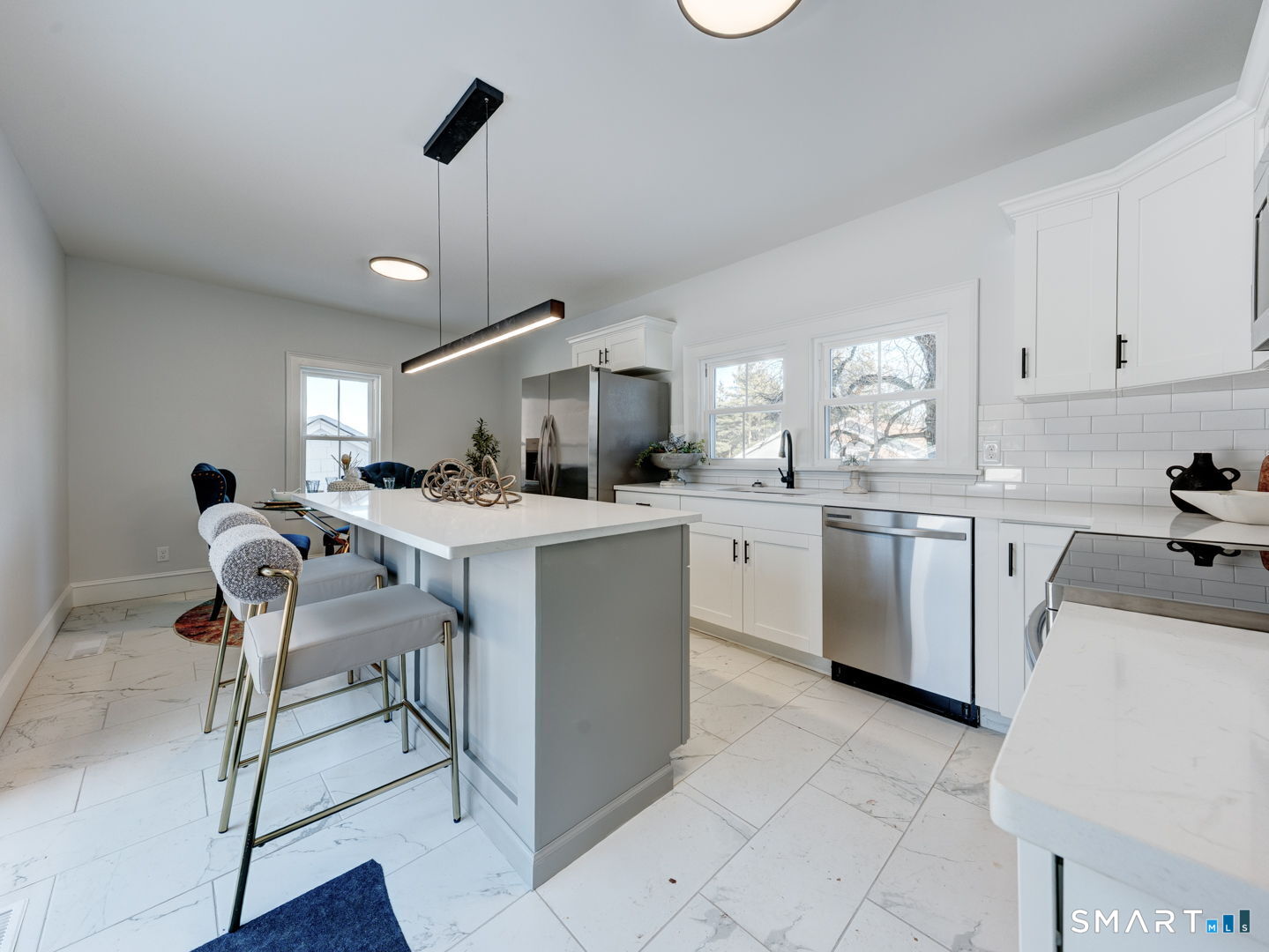 76 Griffin Road East Windsor, CT 06016 - Photo 5 of 35 a kitchen with a sink a counter top space appliances and cabinets