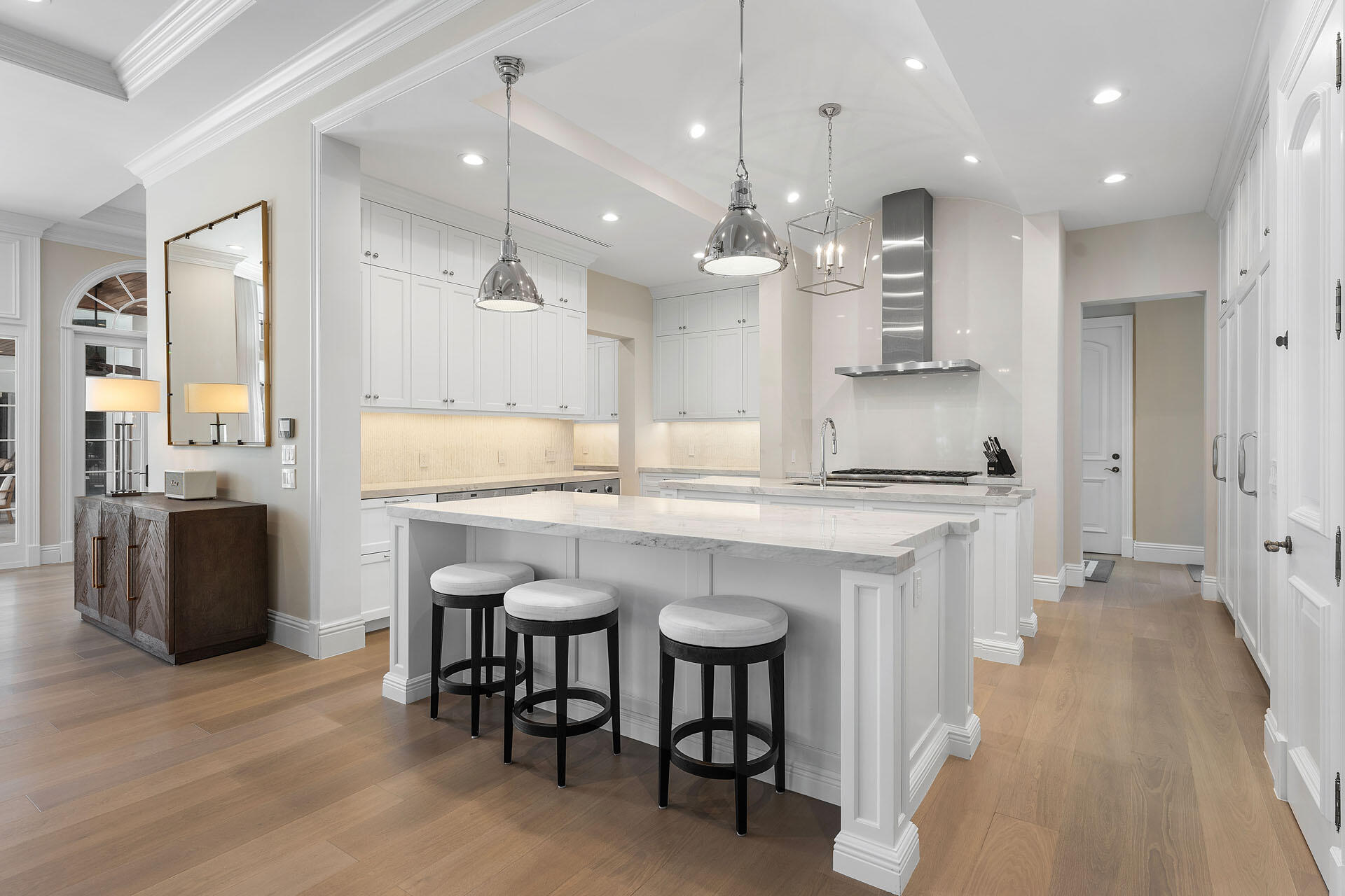 251 Coconut Palm Road Boca Raton, FL 33432 - Photo 18 of 97 a large kitchen with a table and chairs