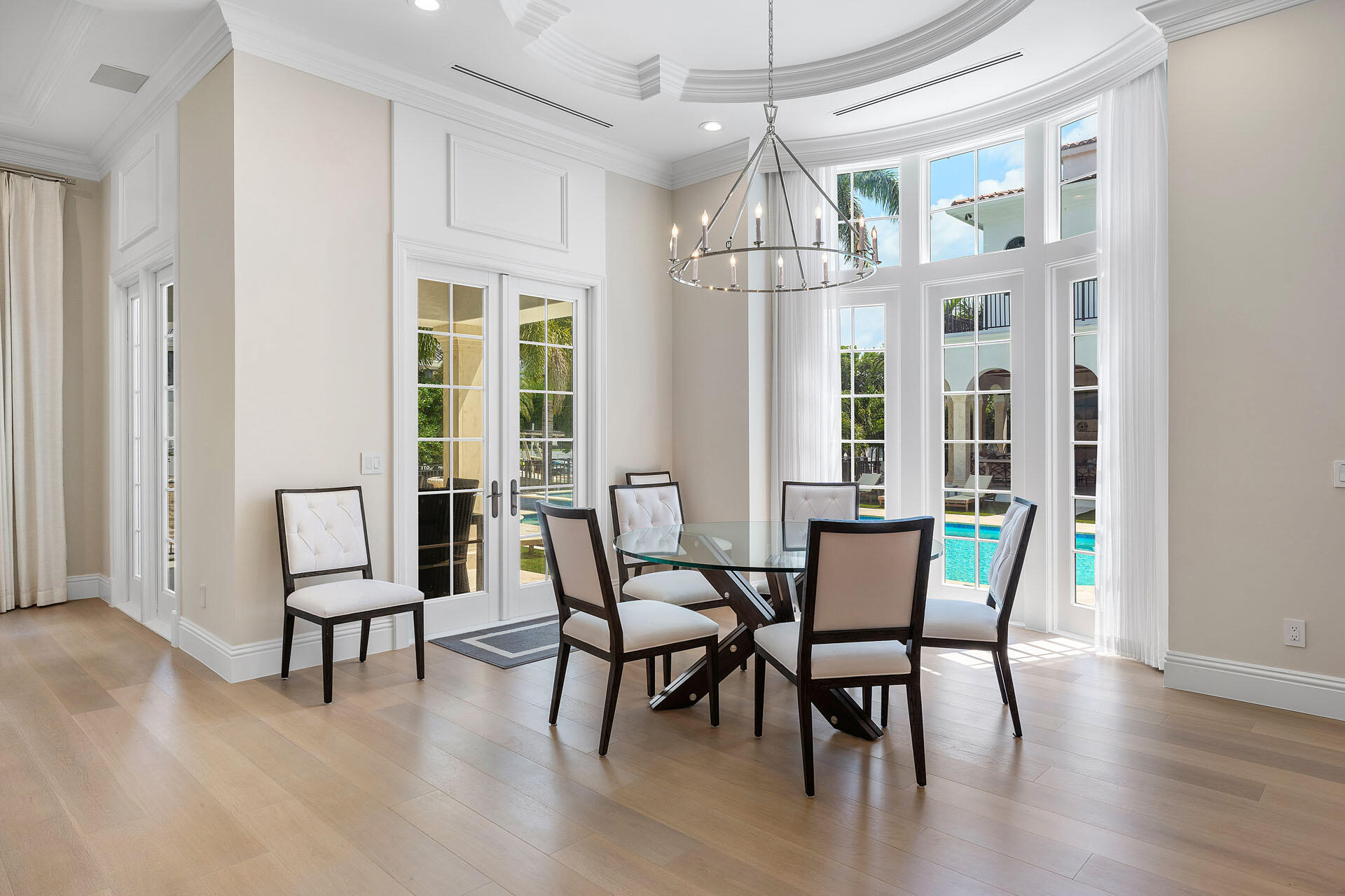 251 Coconut Palm Road Boca Raton, FL 33432 - Photo 22 of 97 a view of a dining room with furniture window and wooden floor
