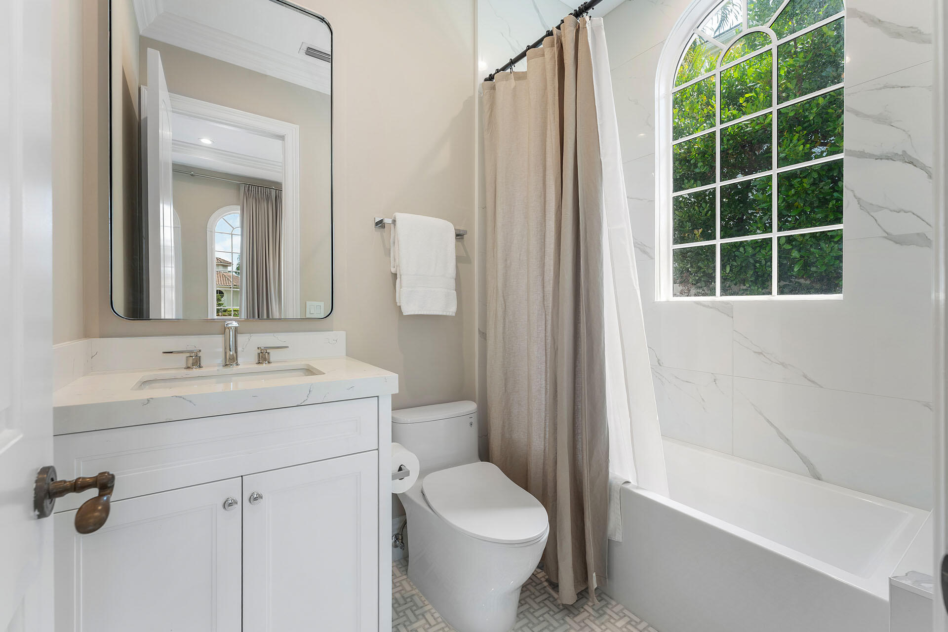 251 Coconut Palm Road Boca Raton, FL 33432 - Photo 46 of 97 a bathroom with a sink toilet and shower