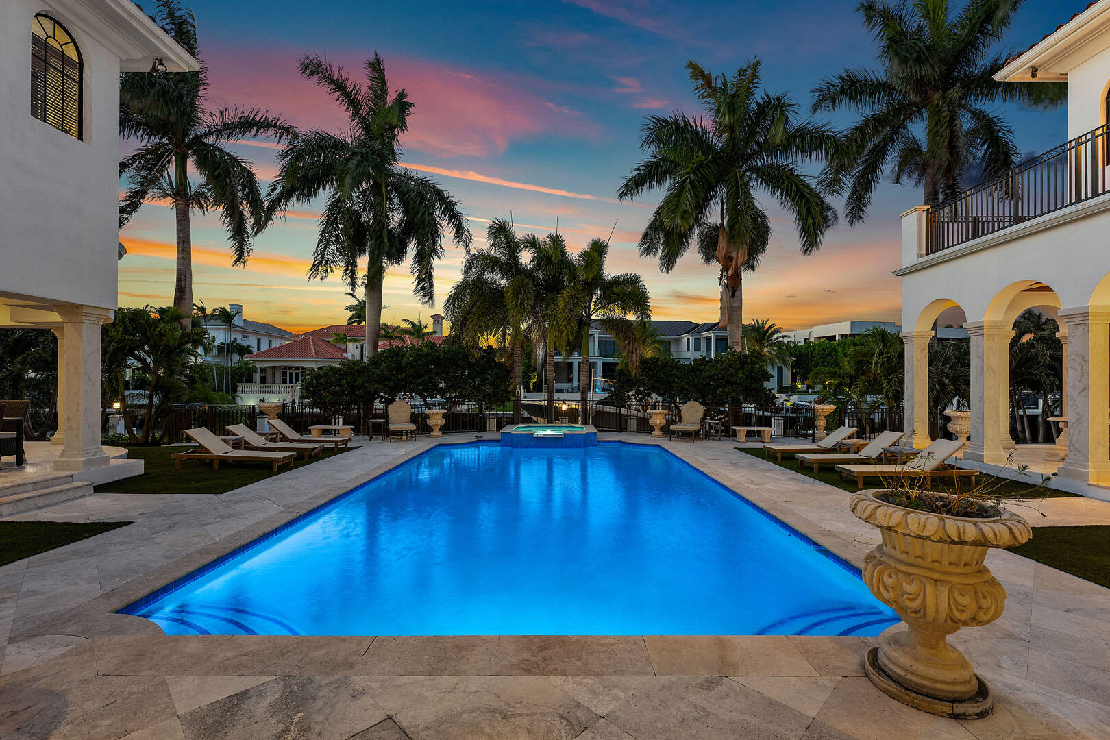 251 Coconut Palm Road Boca Raton, FL 33432 - Photo 78 of 97 a view of swimming pool with outdoor seating and palm trees