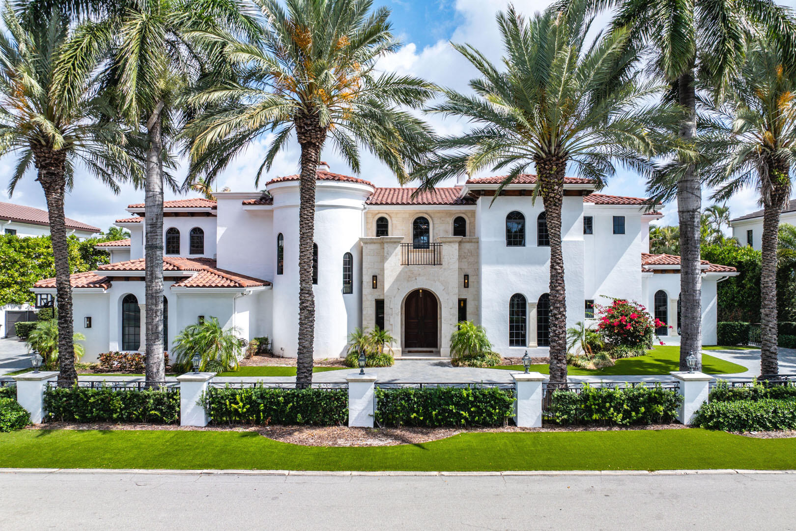 251 Coconut Palm Road Boca Raton, FL 33432 - Photo 89 of 97 a front view of multiple houses with yard