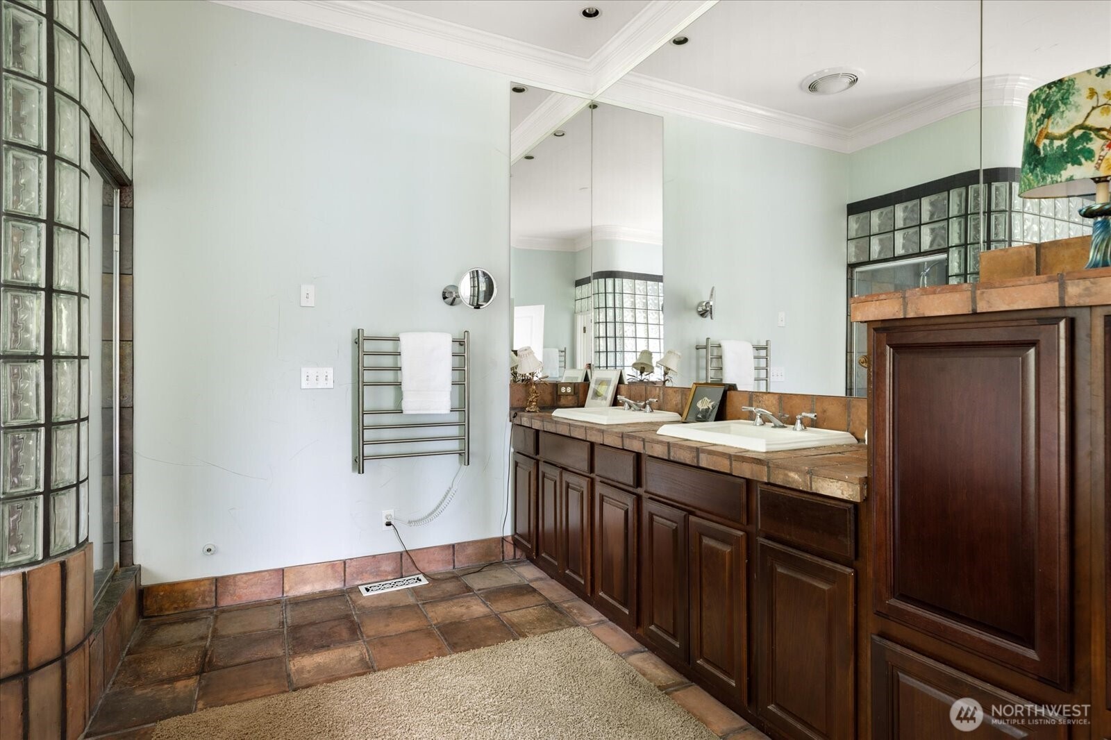 5427 Bayview Road Langley, WA 98260 - Photo 19 of 40 a bathroom with a sink and a mirror