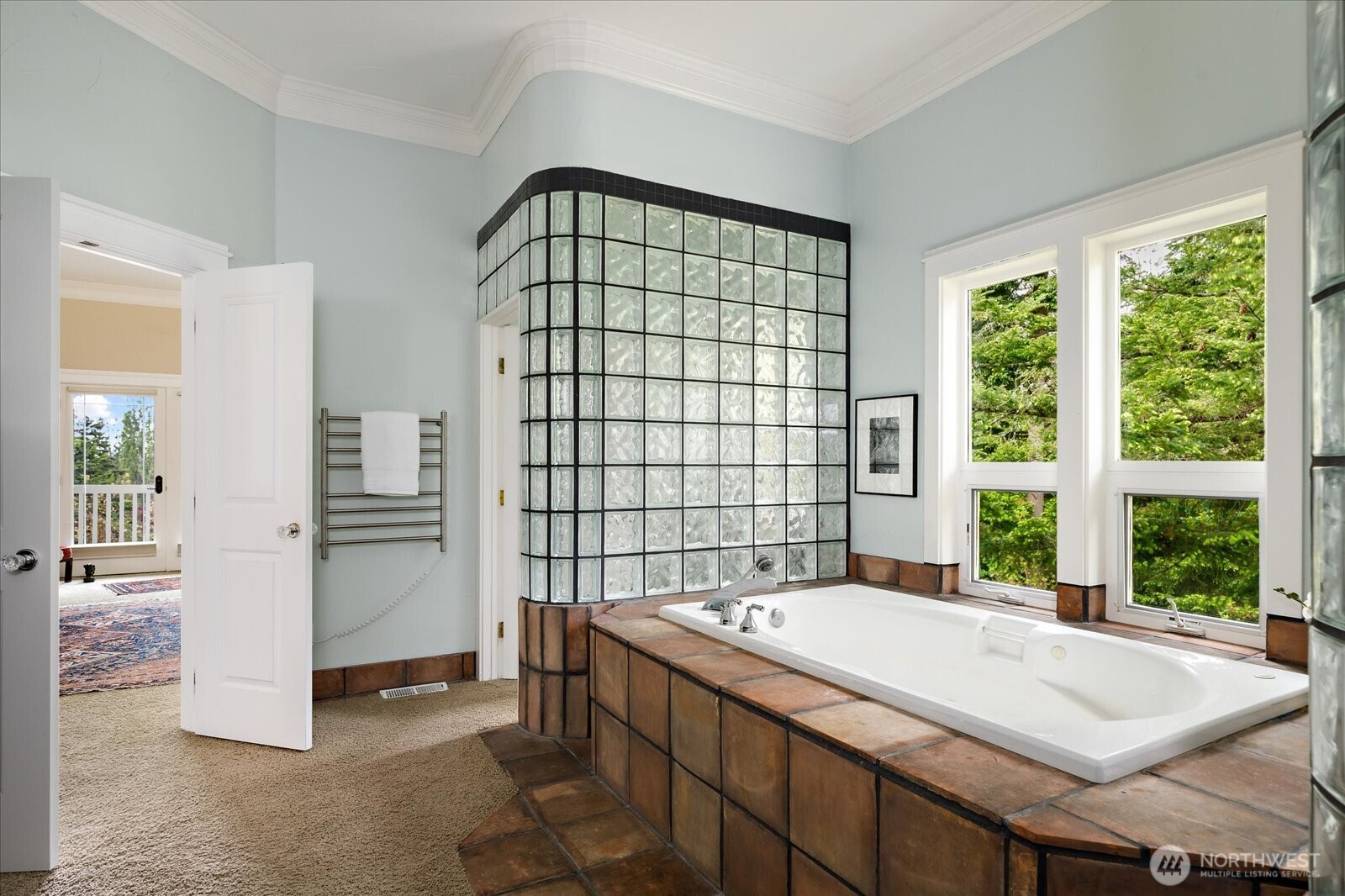 5427 Bayview Road Langley, WA 98260 - Photo 20 of 40 a spacious bedroom with a bed and a window