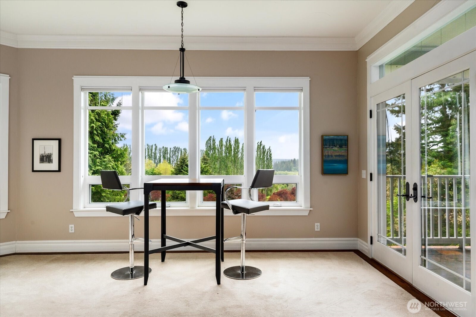5427 Bayview Road Langley, WA 98260 - Photo 23 of 40 a view of a livingroom with furniture window and a ceiling fan