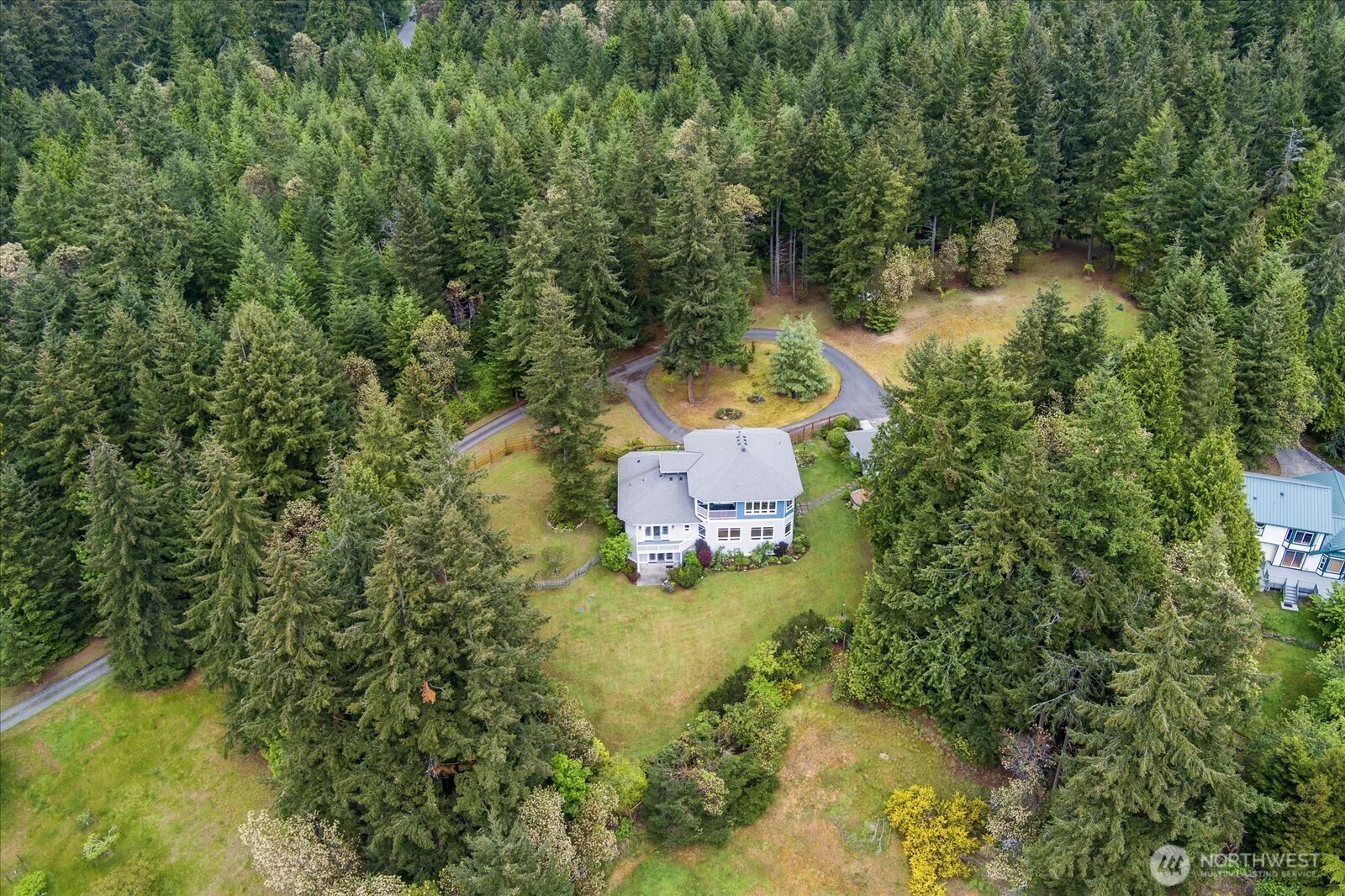 5427 Bayview Road Langley, WA 98260 - Photo 34 of 40 an aerial view of a house with a yard