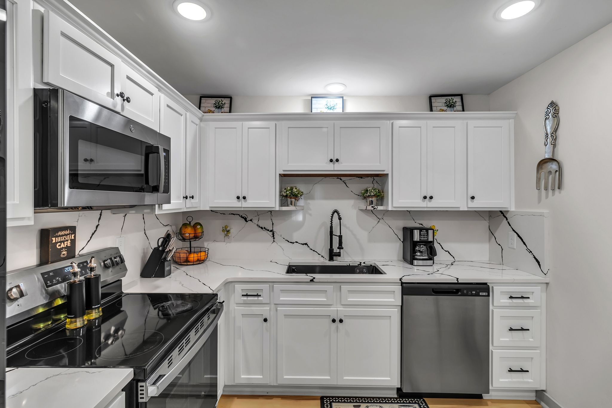 3759 Snell Road Murfreesboro, TN 37127 - Photo 13 of 27 a kitchen with white cabinets and appliances