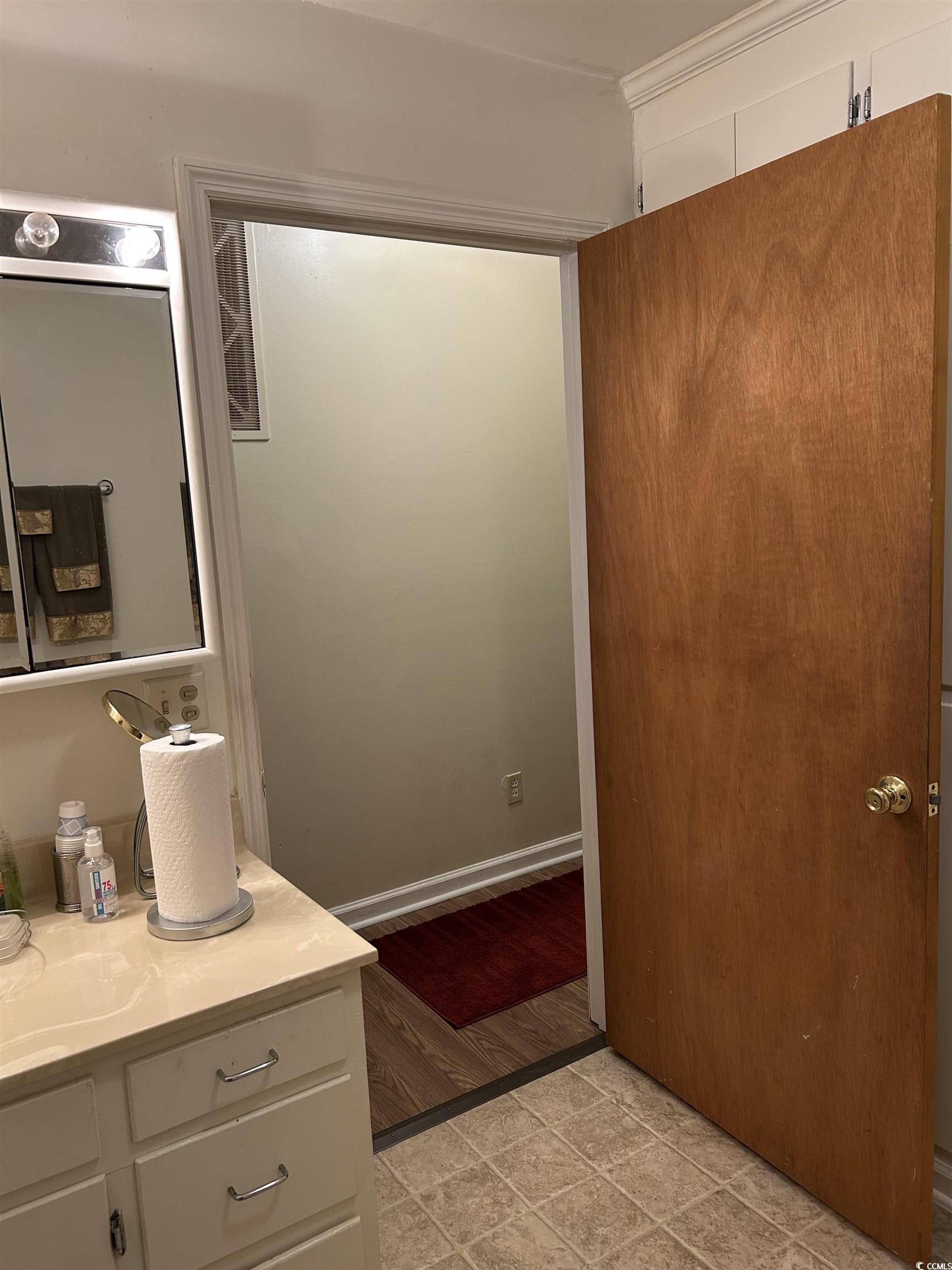 1411 East Harrison Street Dillon, SC 29536 - Photo 24 of 40 Bathroom with baseboards and vanity