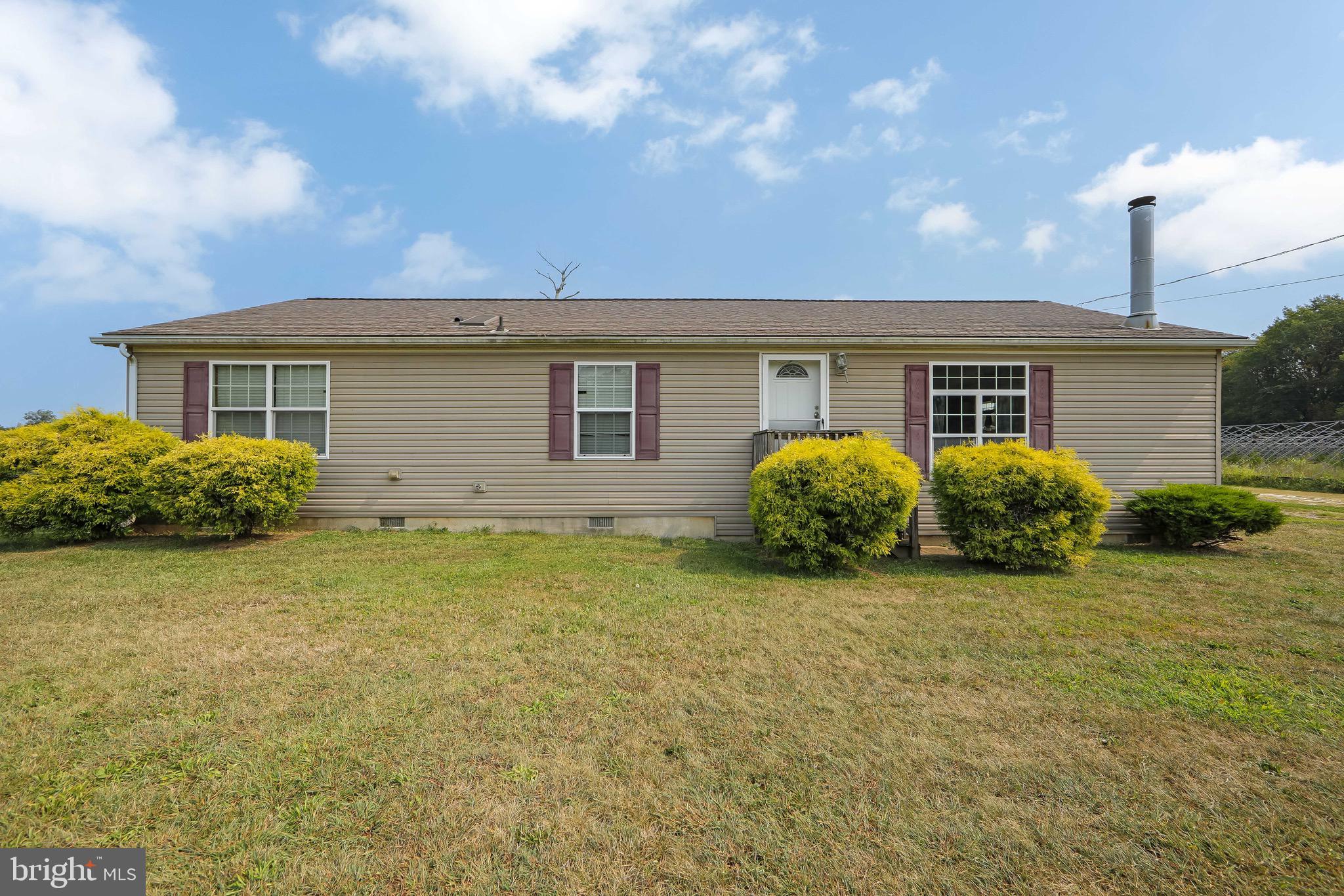 54 Three Bridge Road Monroeville, NJ 08343 - Photo 1 of 35 a view of a house with backyard and garden