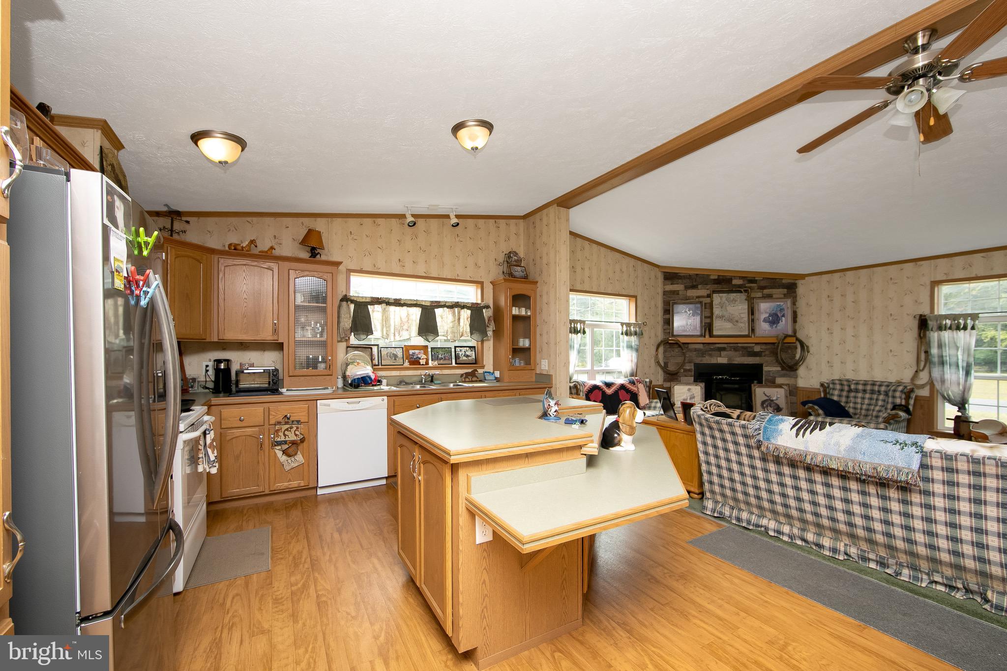 54 Three Bridge Road Monroeville, NJ 08343 - Photo 18 of 35 a kitchen with stainless steel appliances granite countertop a sink a stove and refrigerator