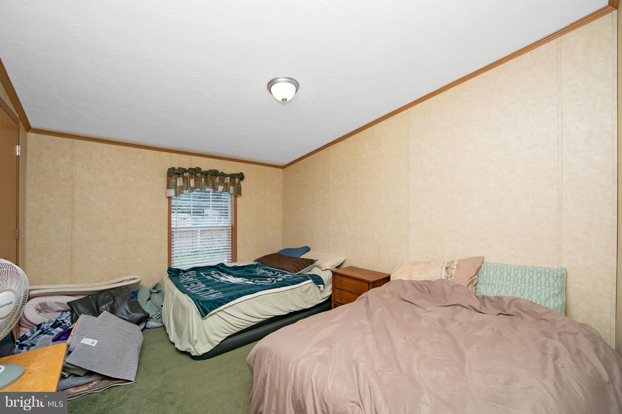 54 Three Bridge Road Monroeville, NJ 08343 - Photo 27 of 35 a bedroom with two beds and painted walls
