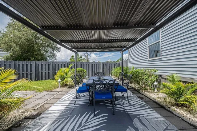 a view of a porch with furniture