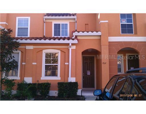 7612 Acklins Road Kissimmee, FL 34747 - Photo 1 of 1 a black and white photo of a building