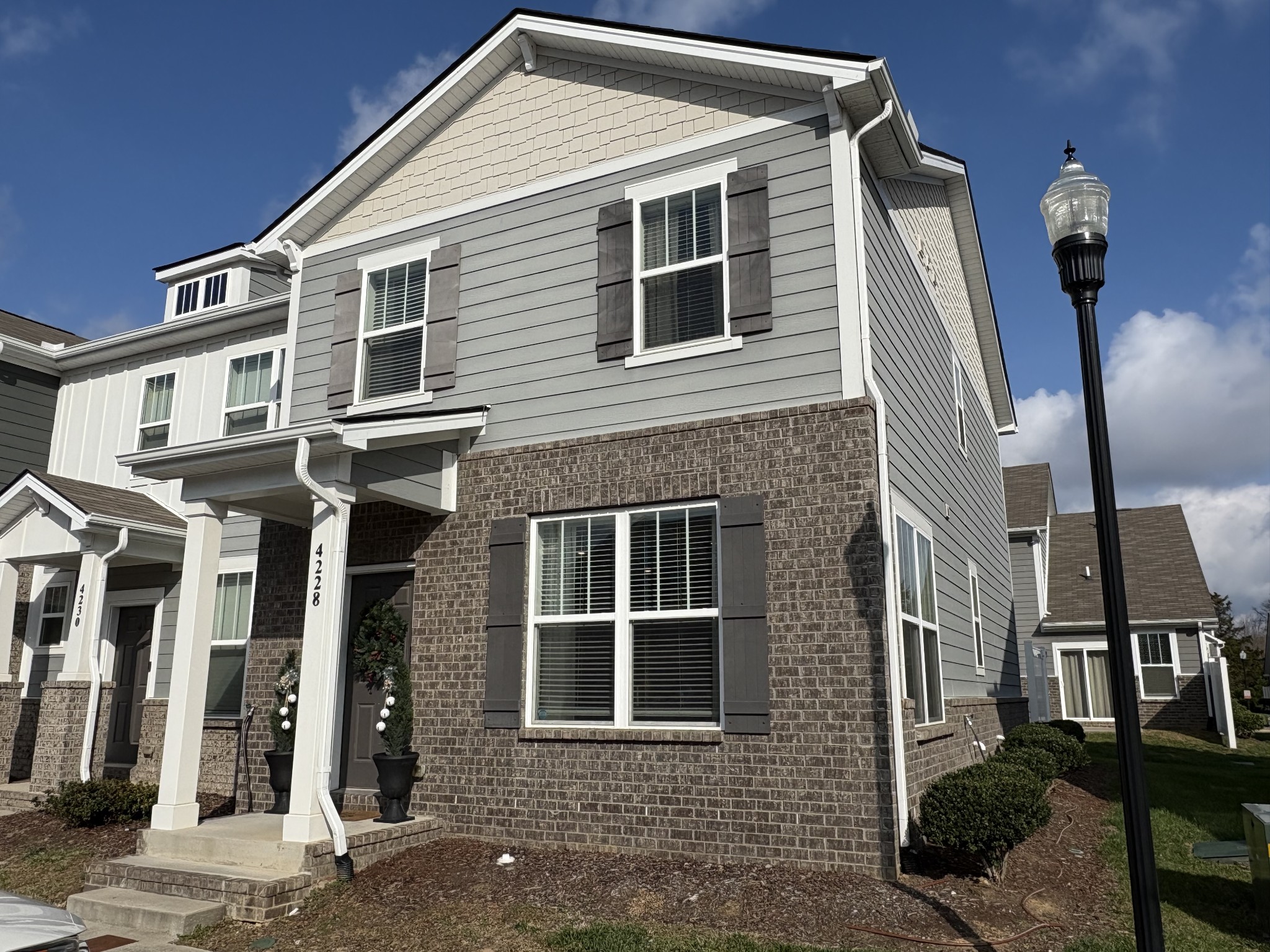 a front view of a house with a garage