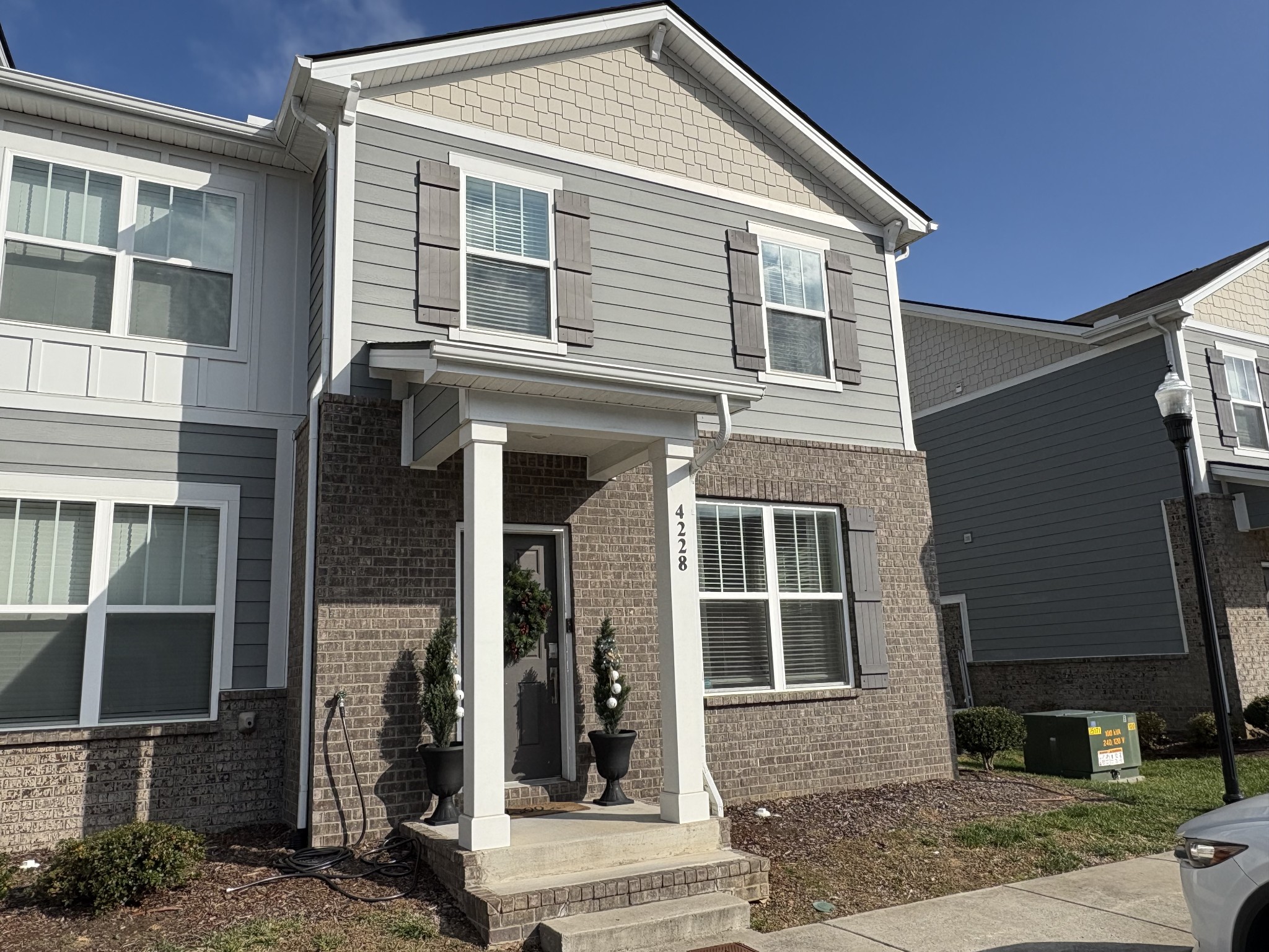 4228 Gandalf Lane Murfreesboro, TN 37128 - Photo 2 of 17 a front view of a house with glass windows