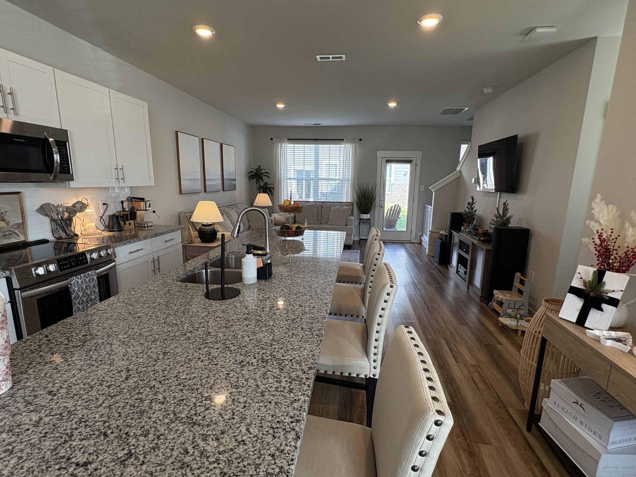 4228 Gandalf Lane Murfreesboro, TN 37128 - Photo 5 of 17 a living room with lots of furniture and kitchen view