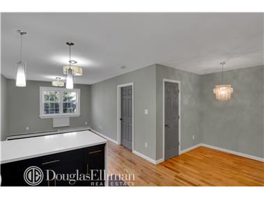 a view of livingroom with kitchen