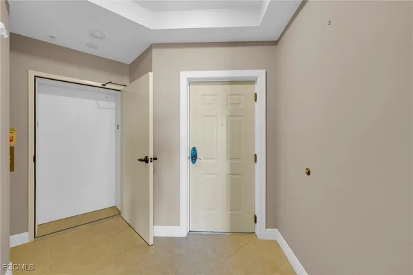a kitchen with stainless steel appliances a refrigerator stove microwave and cabinets