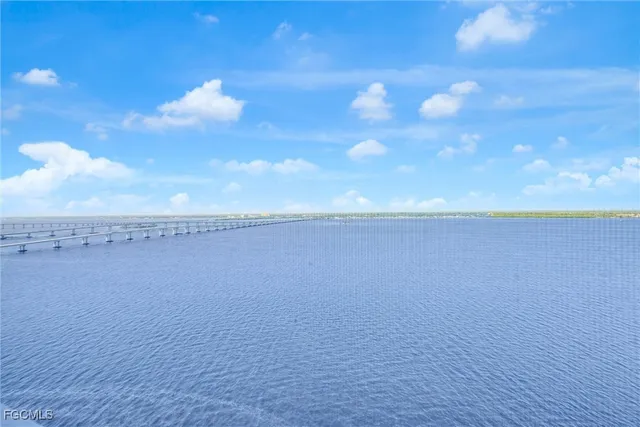 a view of a swimming pool and an outdoor space