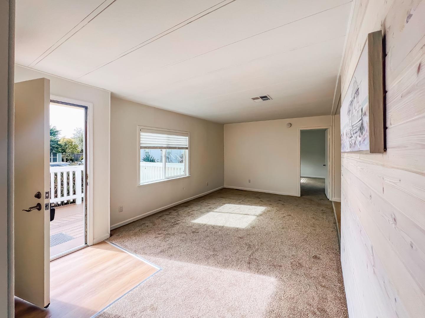 800 Dolan Road, Unit 40 Moss Landing, CA 95039 - Photo 11 of 23 an empty room with windows
