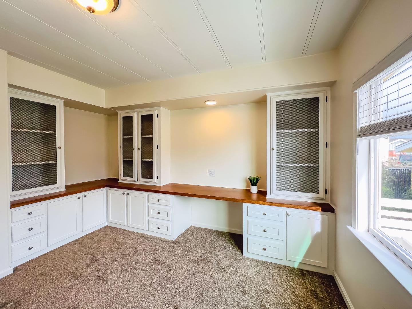 800 Dolan Road, Unit 40 Moss Landing, CA 95039 - Photo 15 of 23 a view of a kitchen with sink cabinet and windows