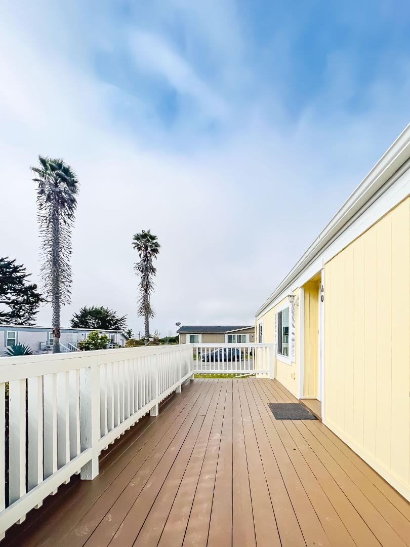 800 Dolan Road, Unit 40 Moss Landing, CA 95039 - Photo 4 of 23 a view of a balcony with wooden floor