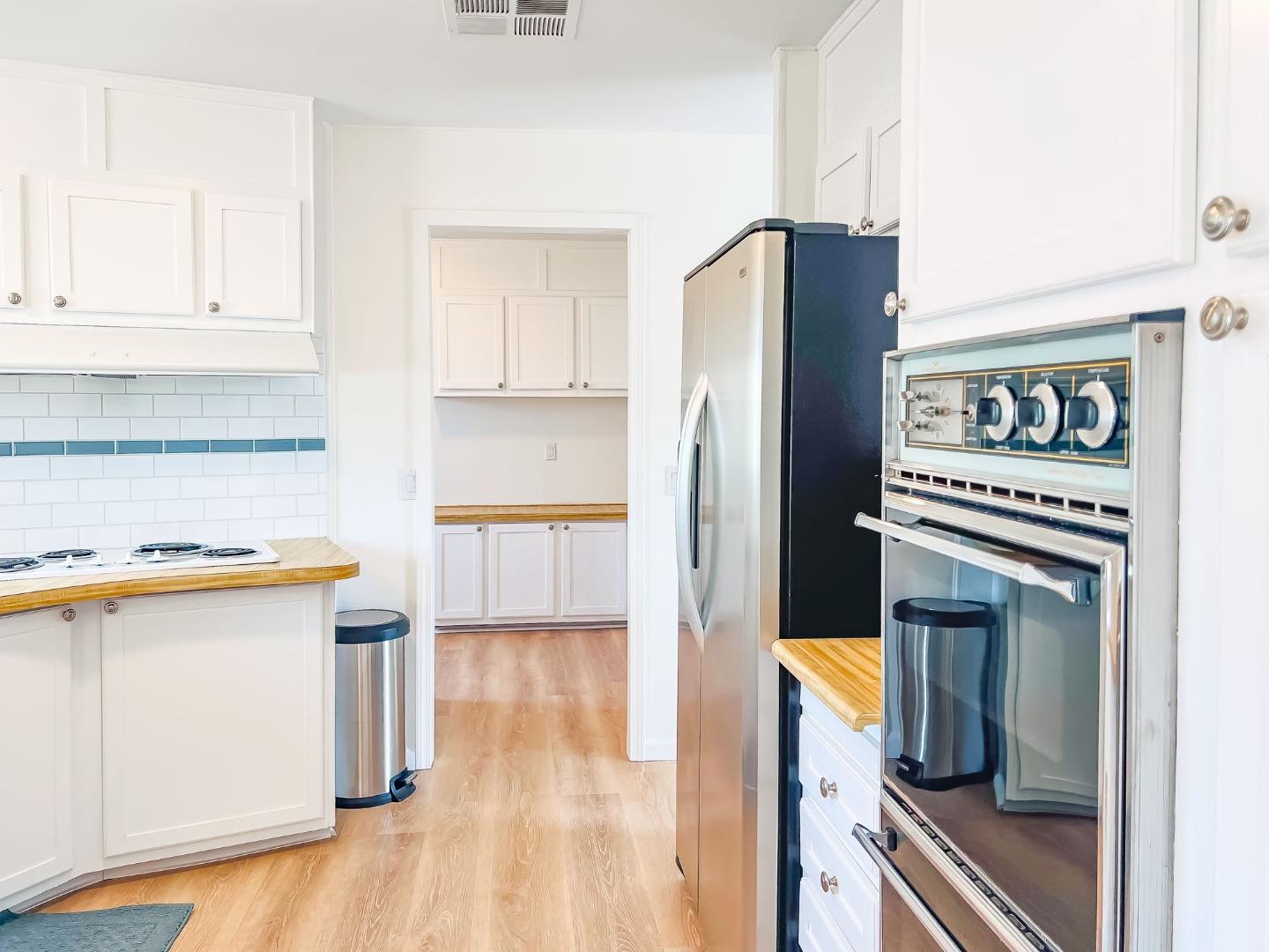 800 Dolan Road, Unit 40 Moss Landing, CA 95039 - Photo 8 of 23 a kitchen with stainless steel appliances a refrigerator and a stove