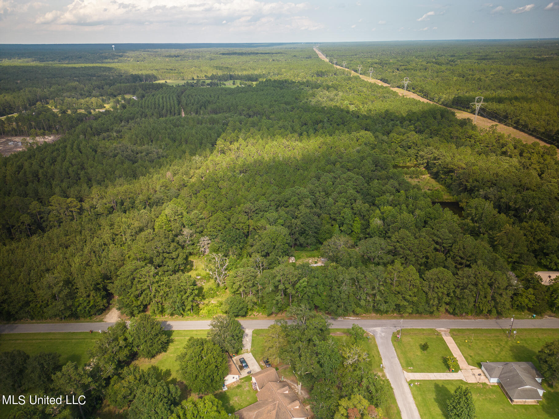20110 Borzik Road Saucier, MS 39574 - Photo 4 of 7 Front showing some of the clearing