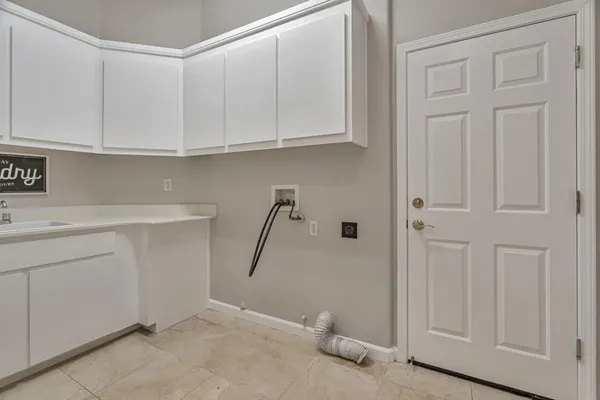 a view of cabinets and wooden floor