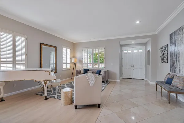 a living room with furniture and a window