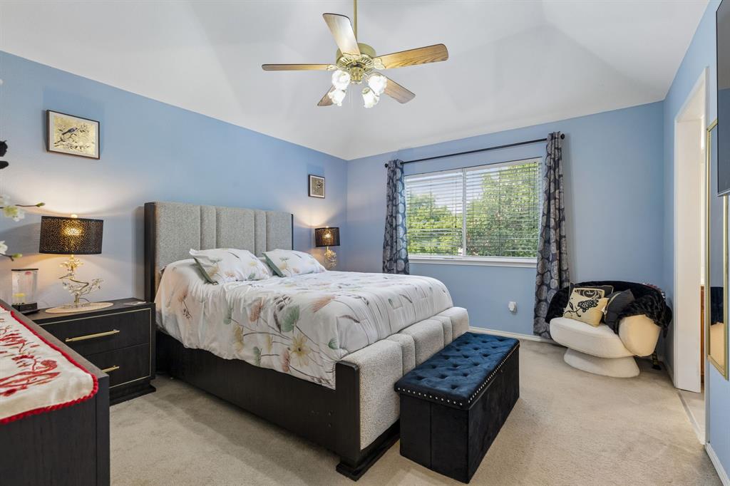 129 Timberbluff Lane Murphy, TX 75094 - Photo 30 of 34 a bedroom with a bed and a window