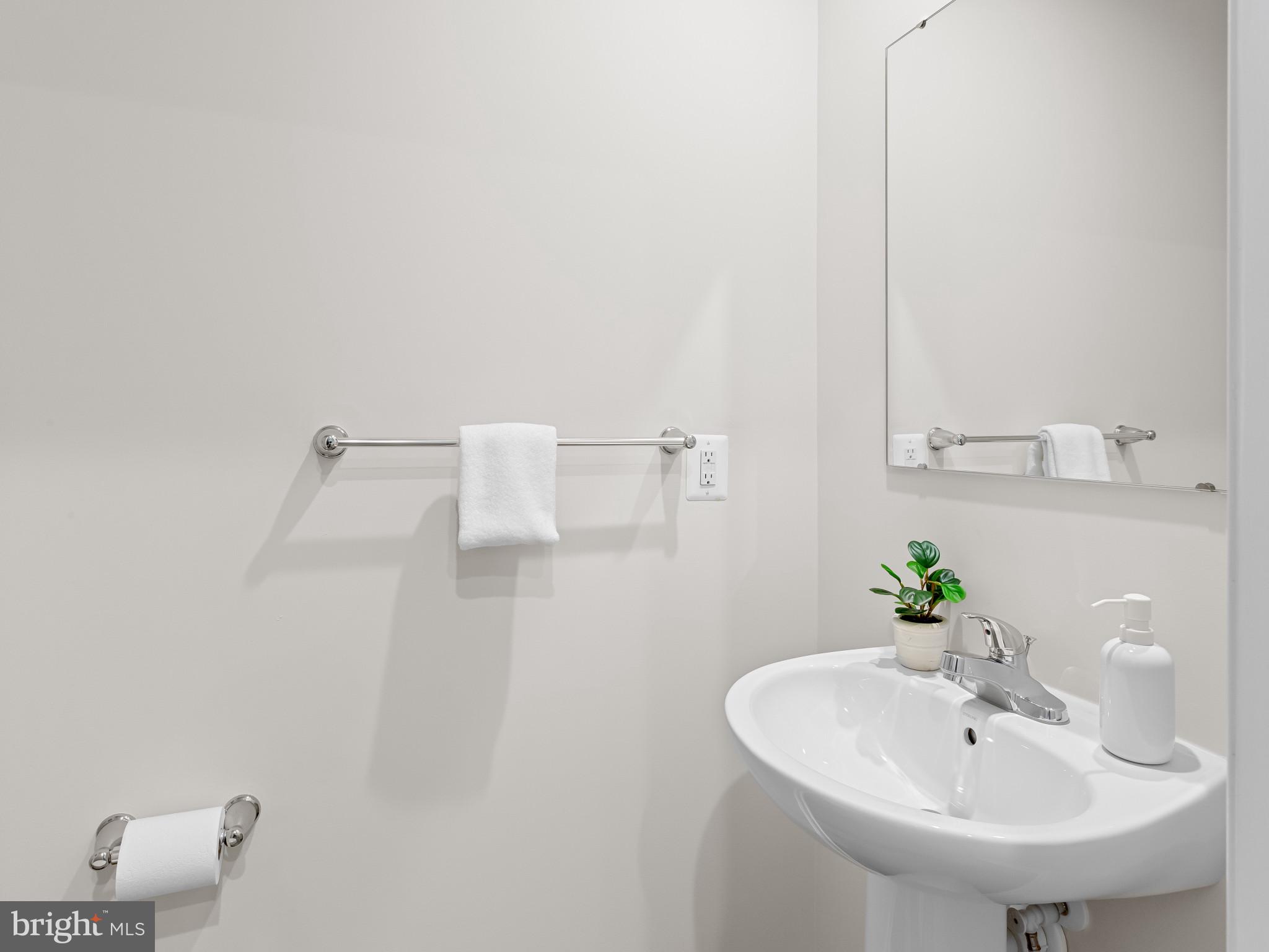 5505 Vergo Road Capitol Heights, MD 20743 - Photo 12 of 42 a bathroom with a sink and a mirror