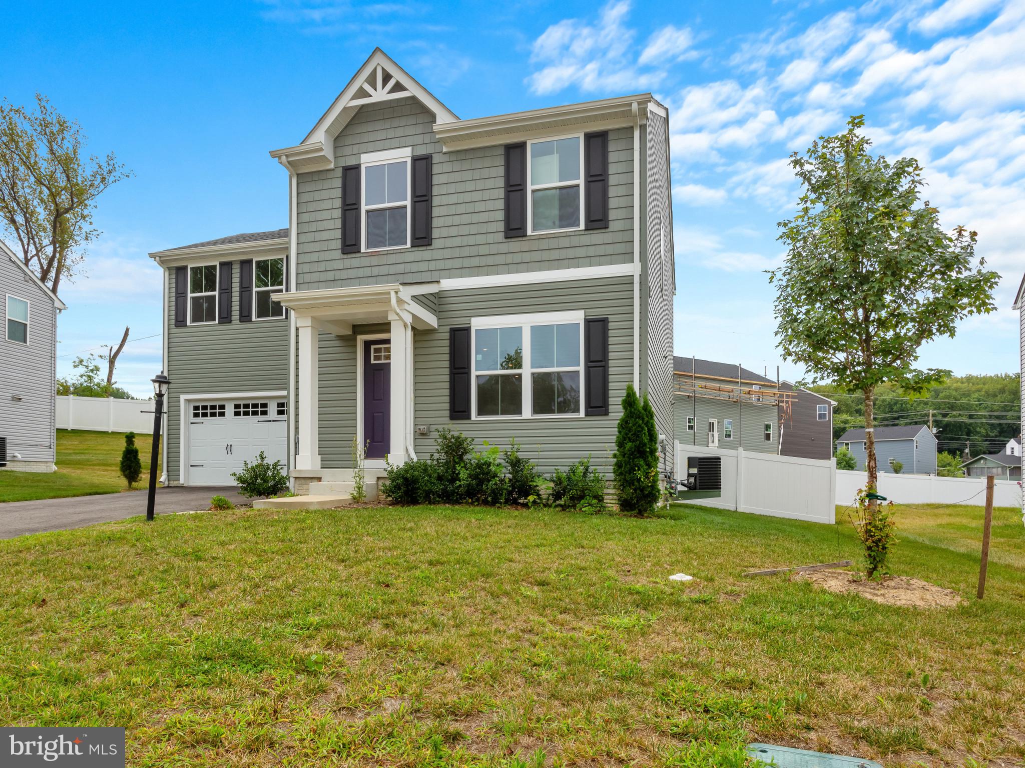 5505 Vergo Road Capitol Heights, MD 20743 - Photo 2 of 42 a front view of a house with a yard