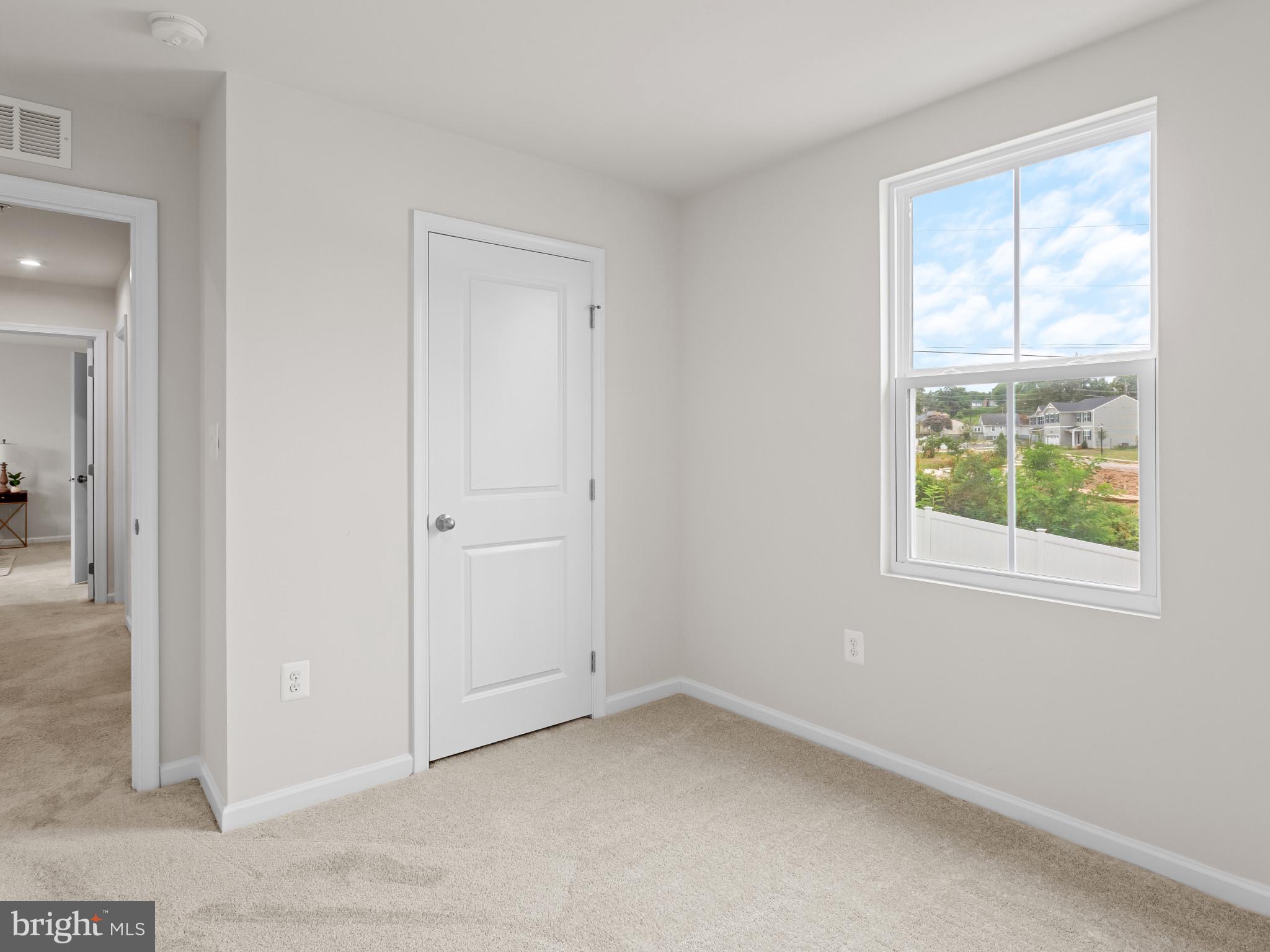 5505 Vergo Road Capitol Heights, MD 20743 - Photo 22 of 42 an empty room with windows