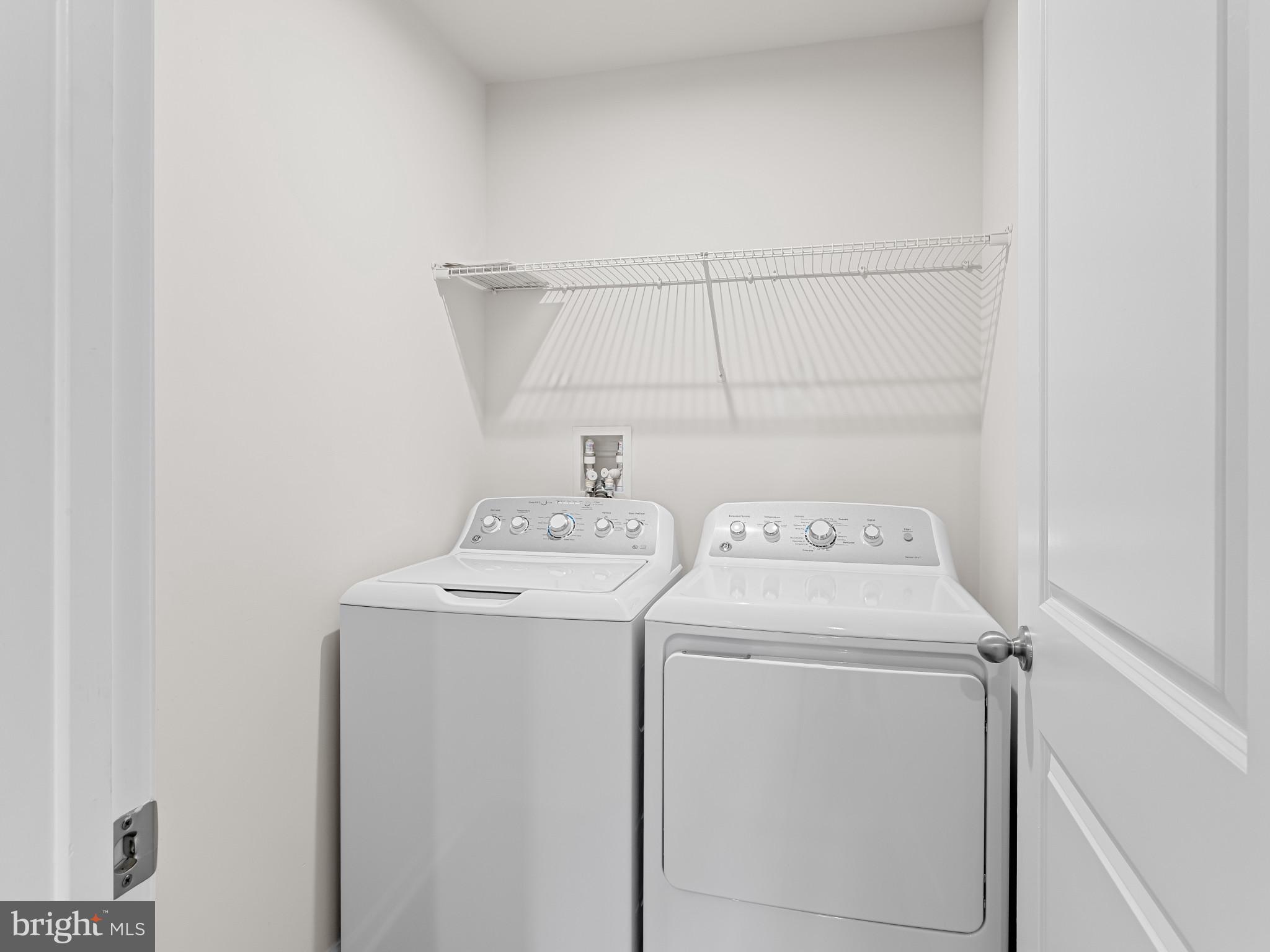 5505 Vergo Road Capitol Heights, MD 20743 - Photo 32 of 42 a utility room with dryer and washer