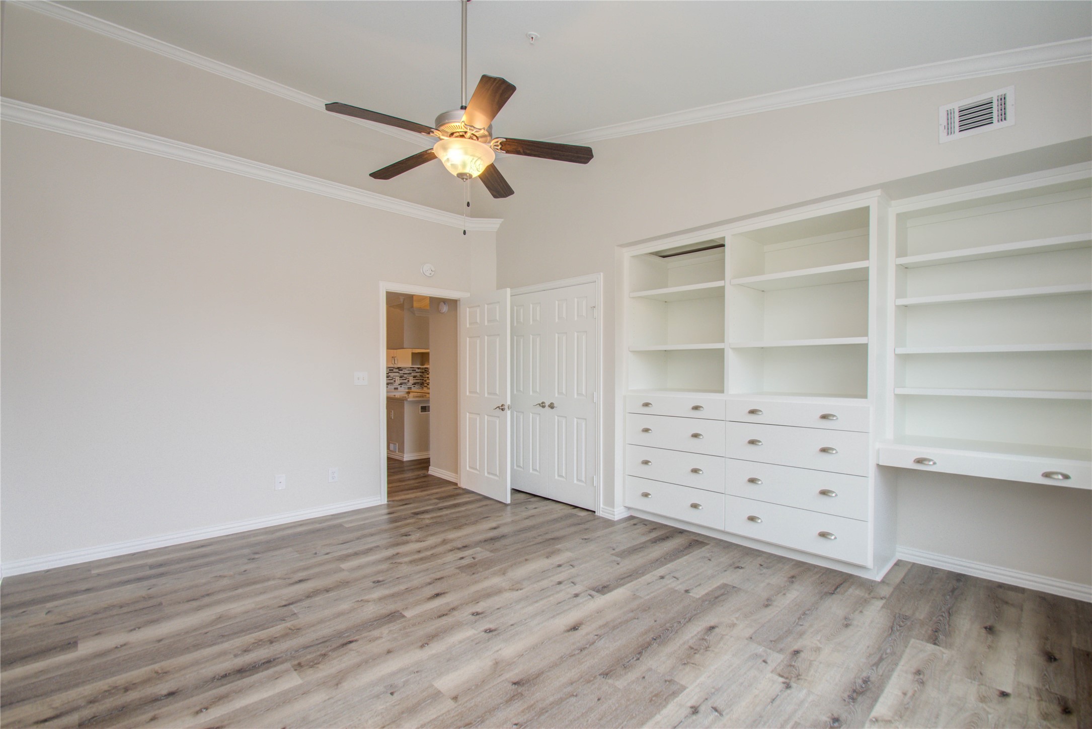 2111 Welch Street, Unit A321 Houston, TX 77019 - Photo 11 of 25 wooden floor in an empty room