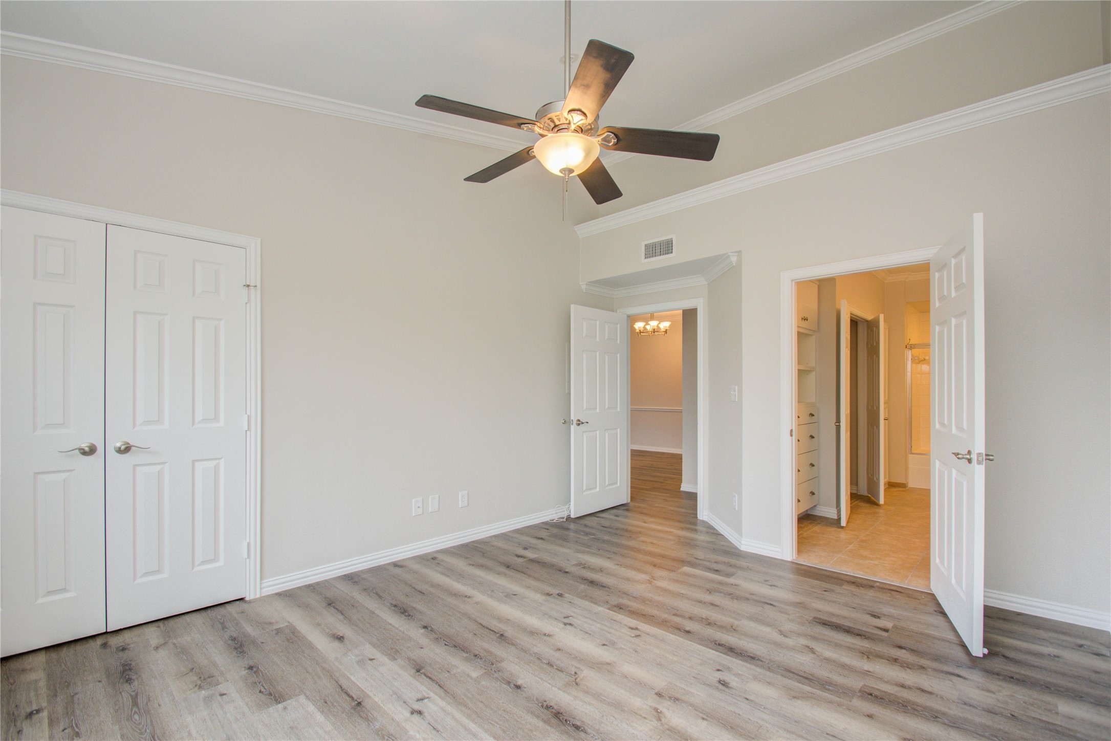 2111 Welch Street, Unit A321 Houston, TX 77019 - Photo 17 of 25 a view of an empty room with wooden floor