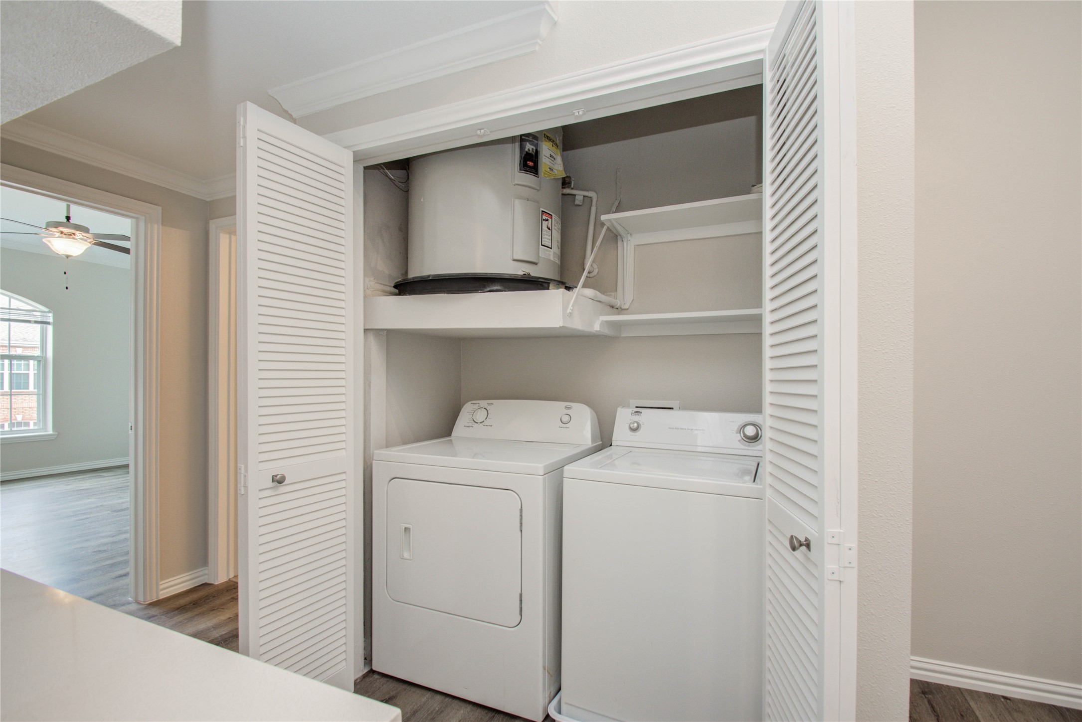 2111 Welch Street, Unit A321 Houston, TX 77019 - Photo 20 of 25 a utility room with dryer and washer