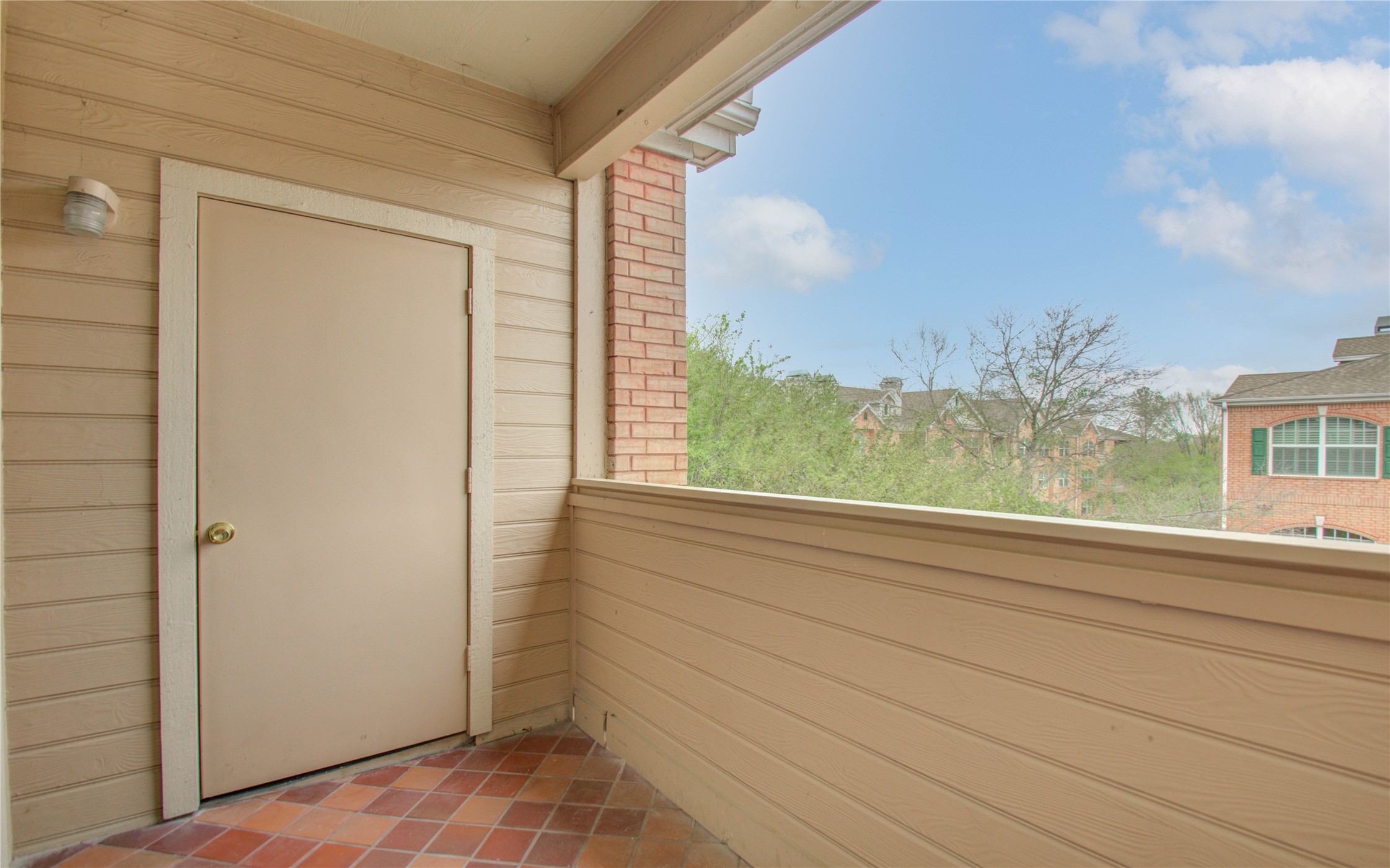 2111 Welch Street, Unit A321 Houston, TX 77019 - Photo 21 of 25 a view of a glass door and a window