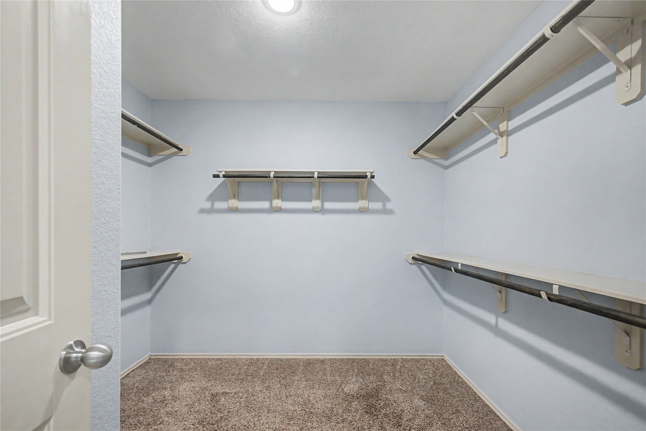 16430 Rodeo River Road Houston, TX 77049 - Photo 32 of 34 a view of a hallway with closet