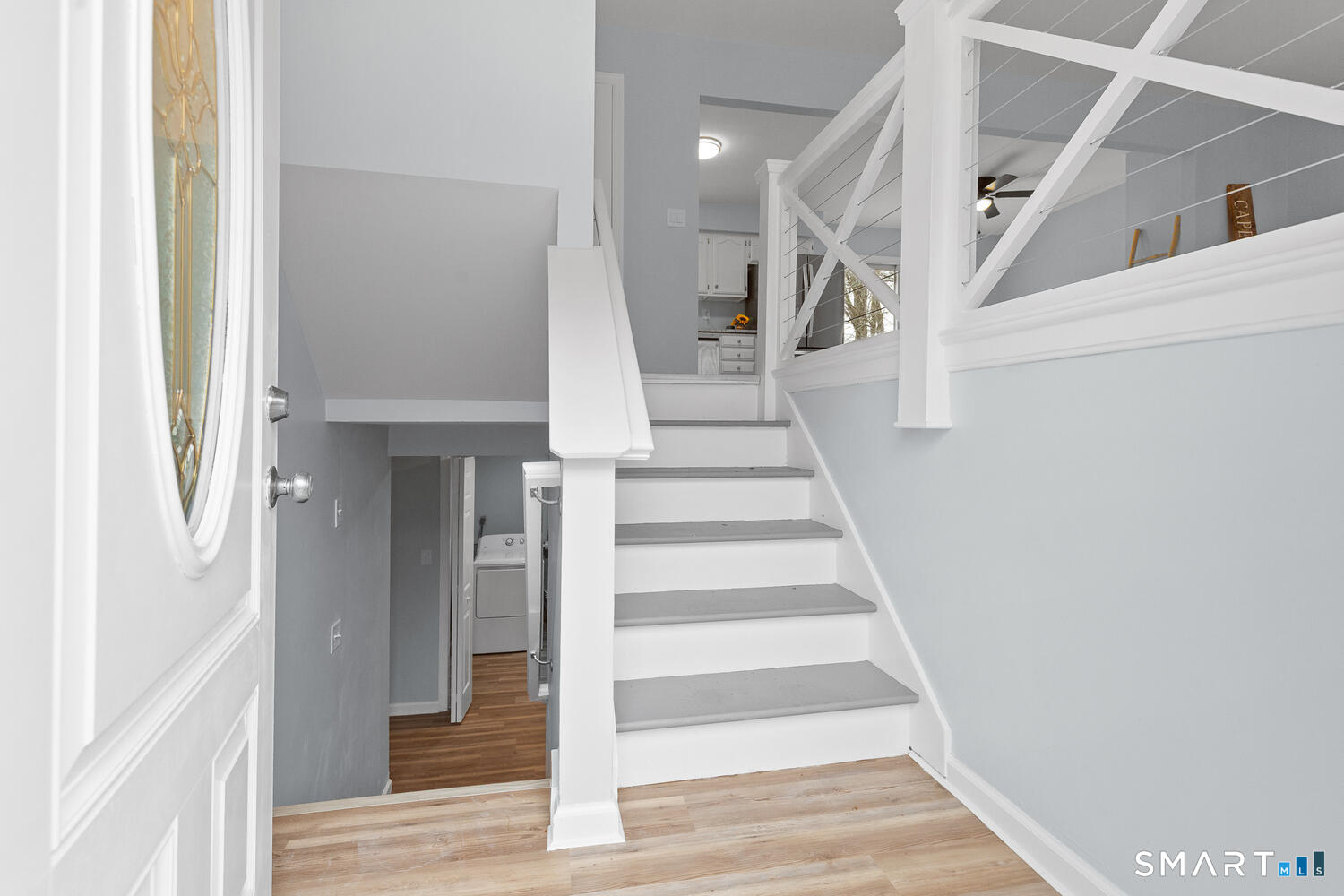 33 Deer Ridge Road Stonington, CT 06378 - Photo 15 of 25 a view of entryway and hall with wooden floor