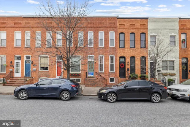a car parked in front of a building