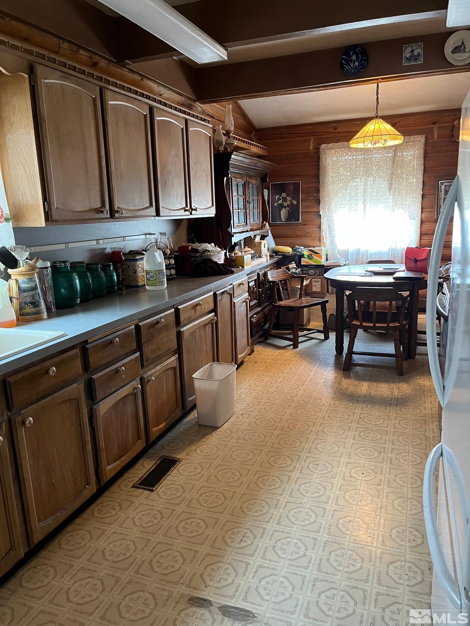 3501 Boyer Road Fallon, NV 89406 - Photo 3 of 14 a open kitchen with stainless steel appliances granite countertop a sink dishwasher stove and cabinets