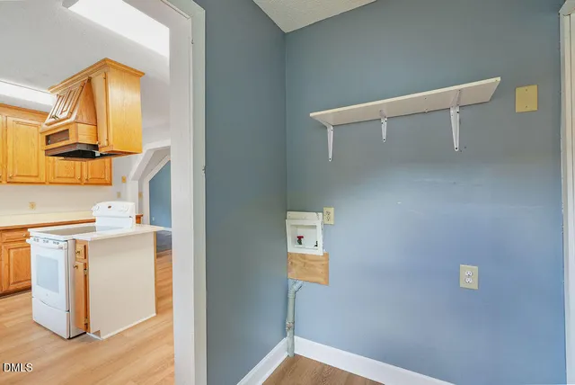 a view of kitchen and utility room
